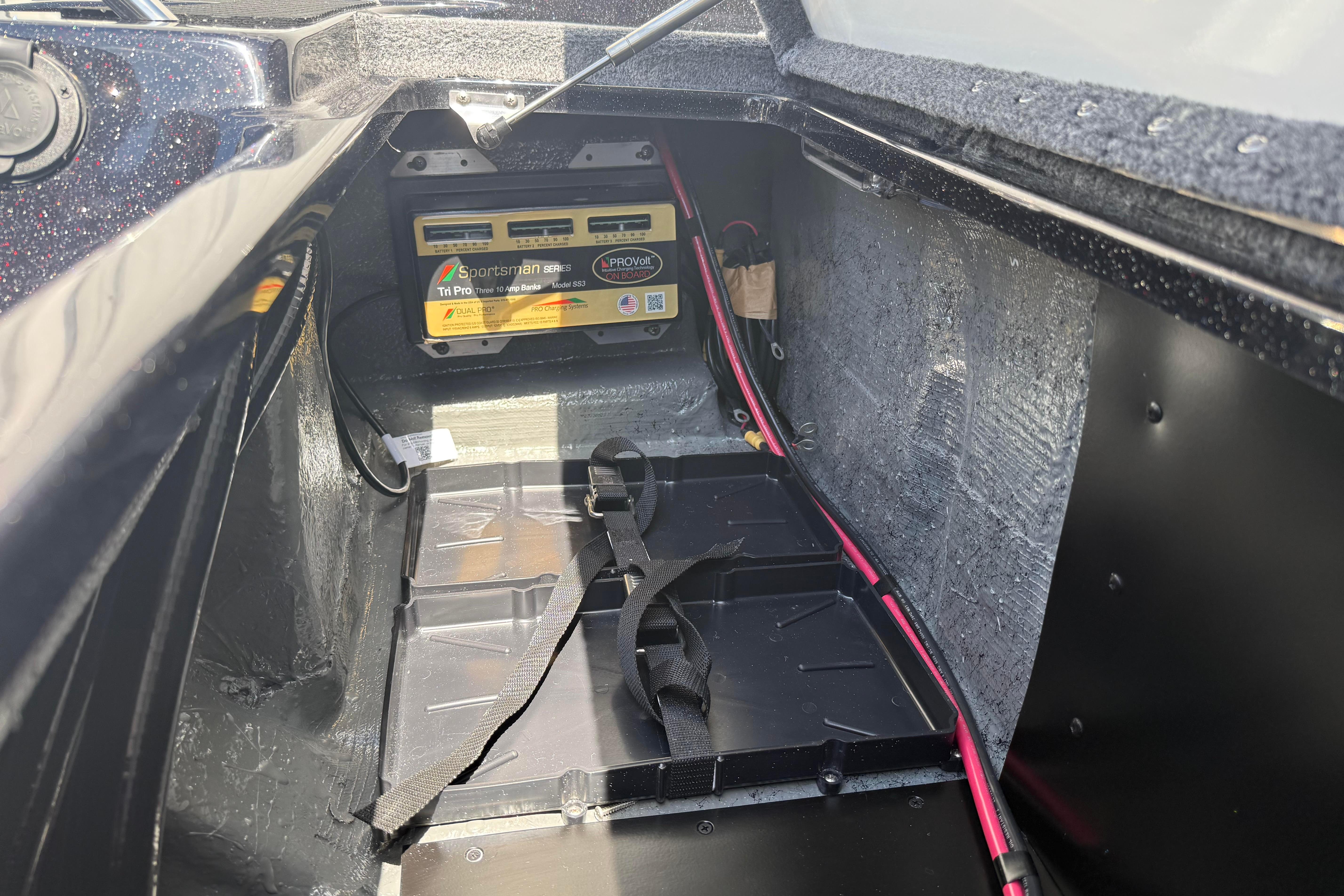 Battery compartment of a 2027 Phoenix 919 ZXL boat, featuring a Sportsman Series battery.
