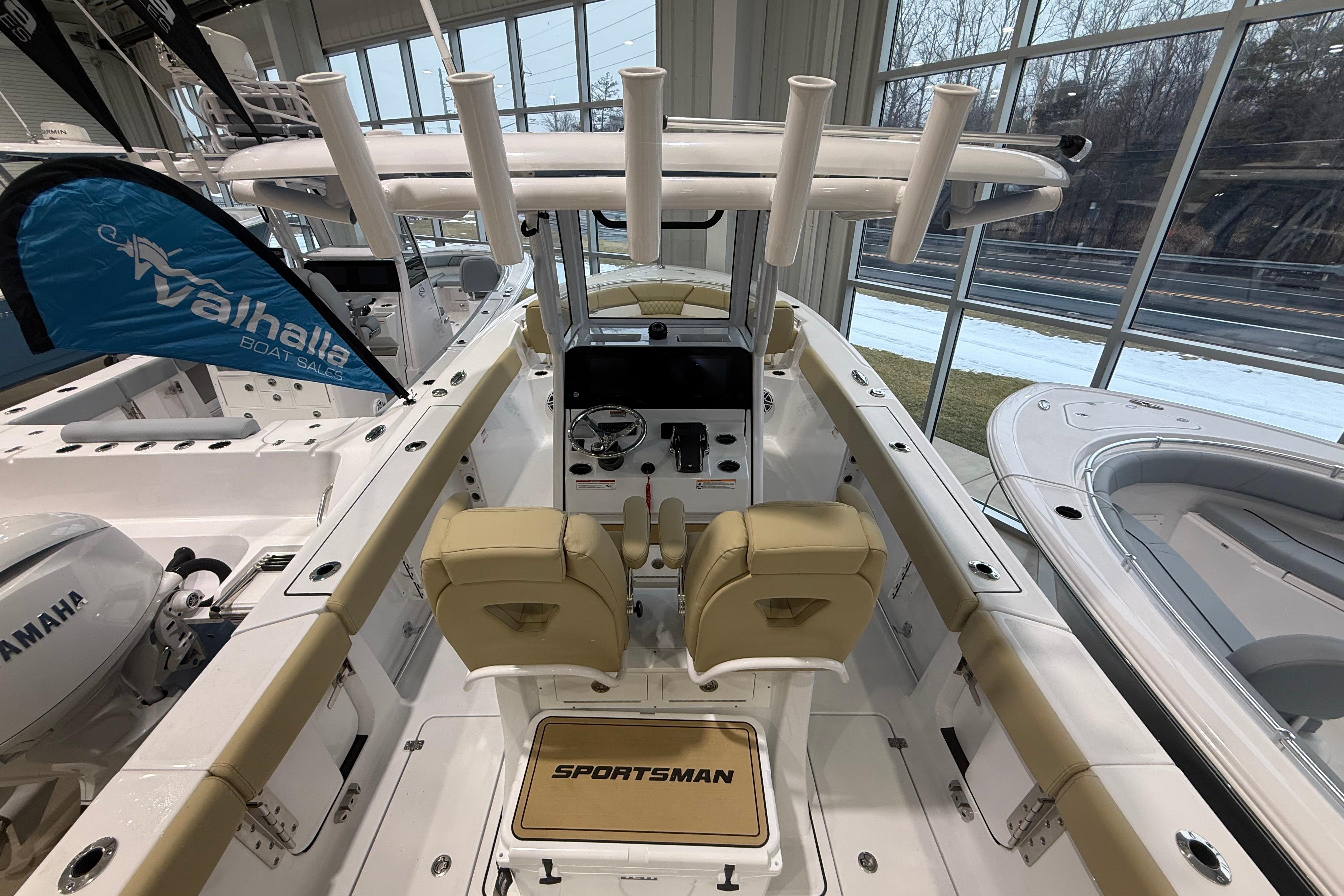 2026 Sportsman Heritage 261 Center Console boat interior with dual seats and steering console.