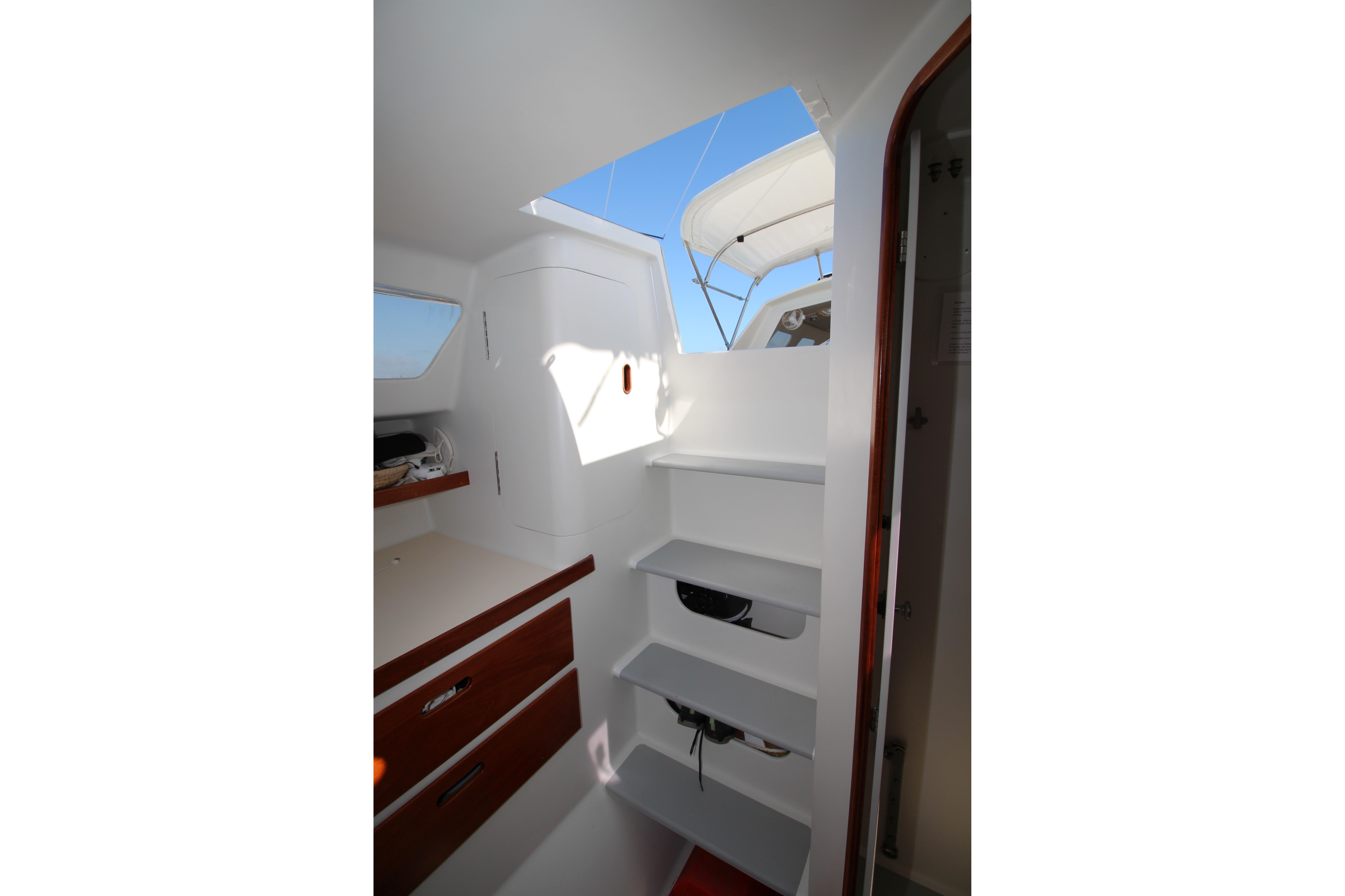 Companionway to aft cabin, door to head on right.