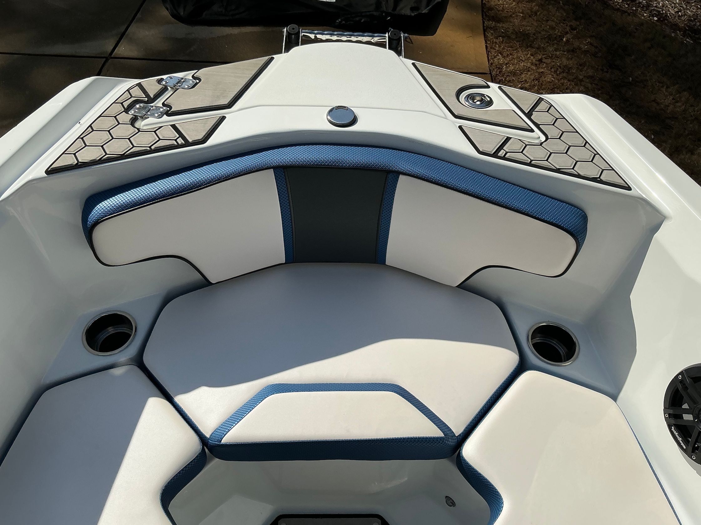 Interior of a 2021 Scarab 215 ID boat with blue accents.
