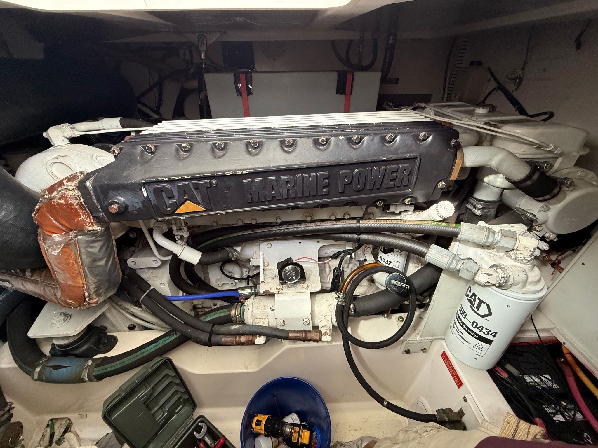Engine room of a 2005 Cabo Express with CAT Marine Power engine.