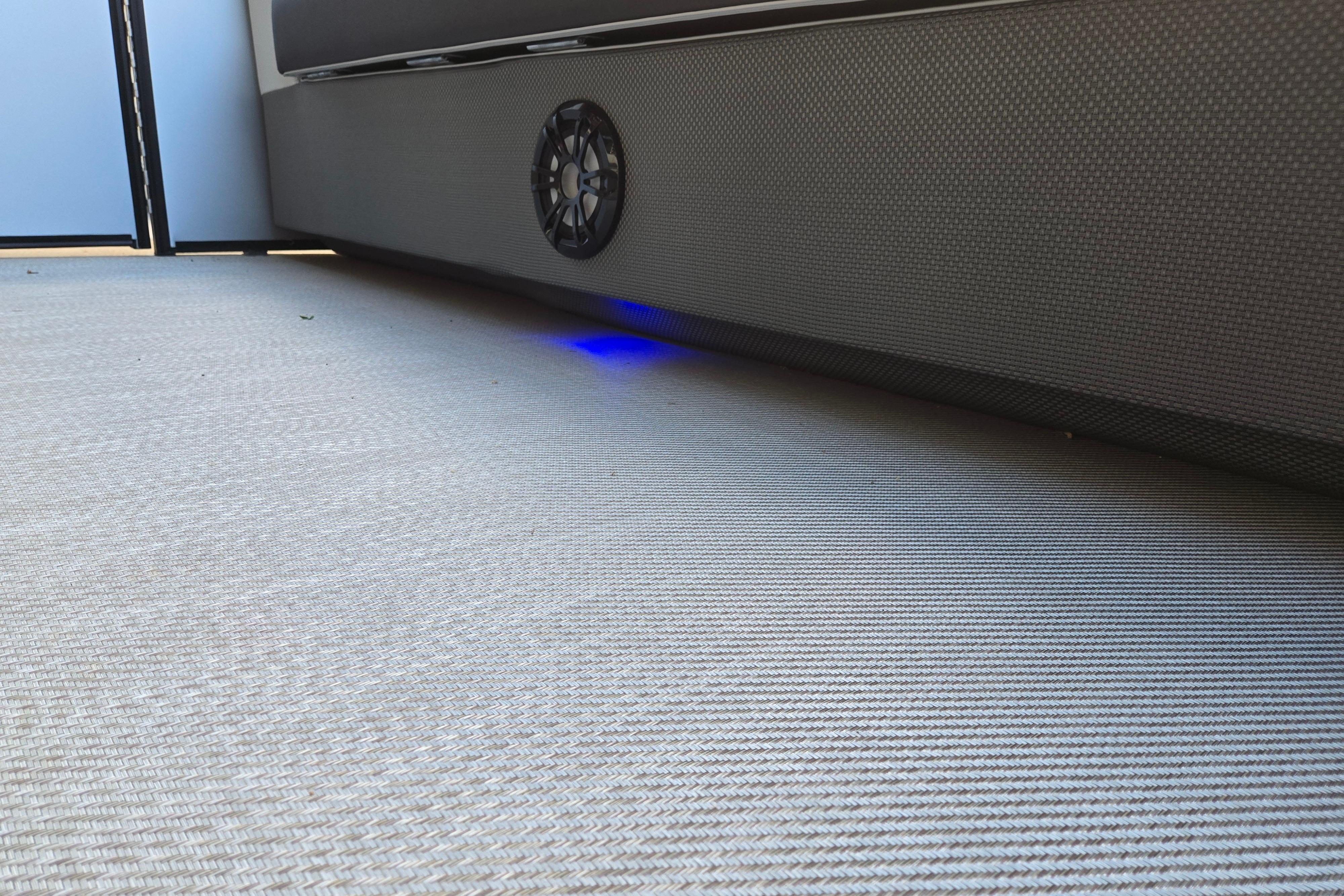 2024 Godfrey Sweetwater 2486 SB interior with speaker and blue LED lighting.