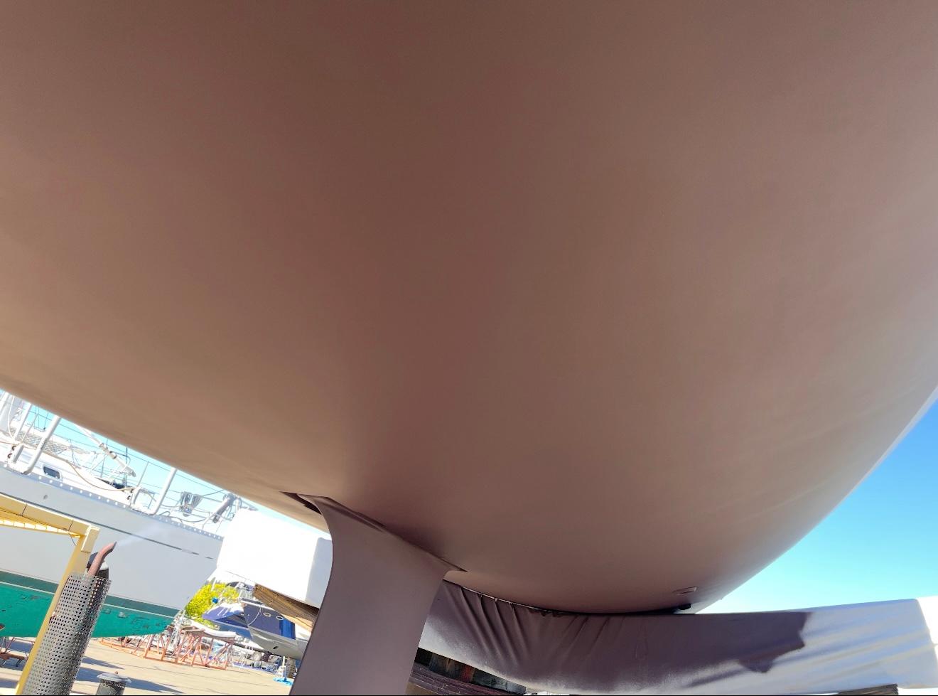 Underside view of a 2018 Seascape 27 sailboat in a boatyard.
