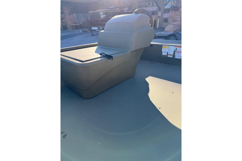 2026 Tracker Grizzly 1648 SC boat interior with console and seating area.