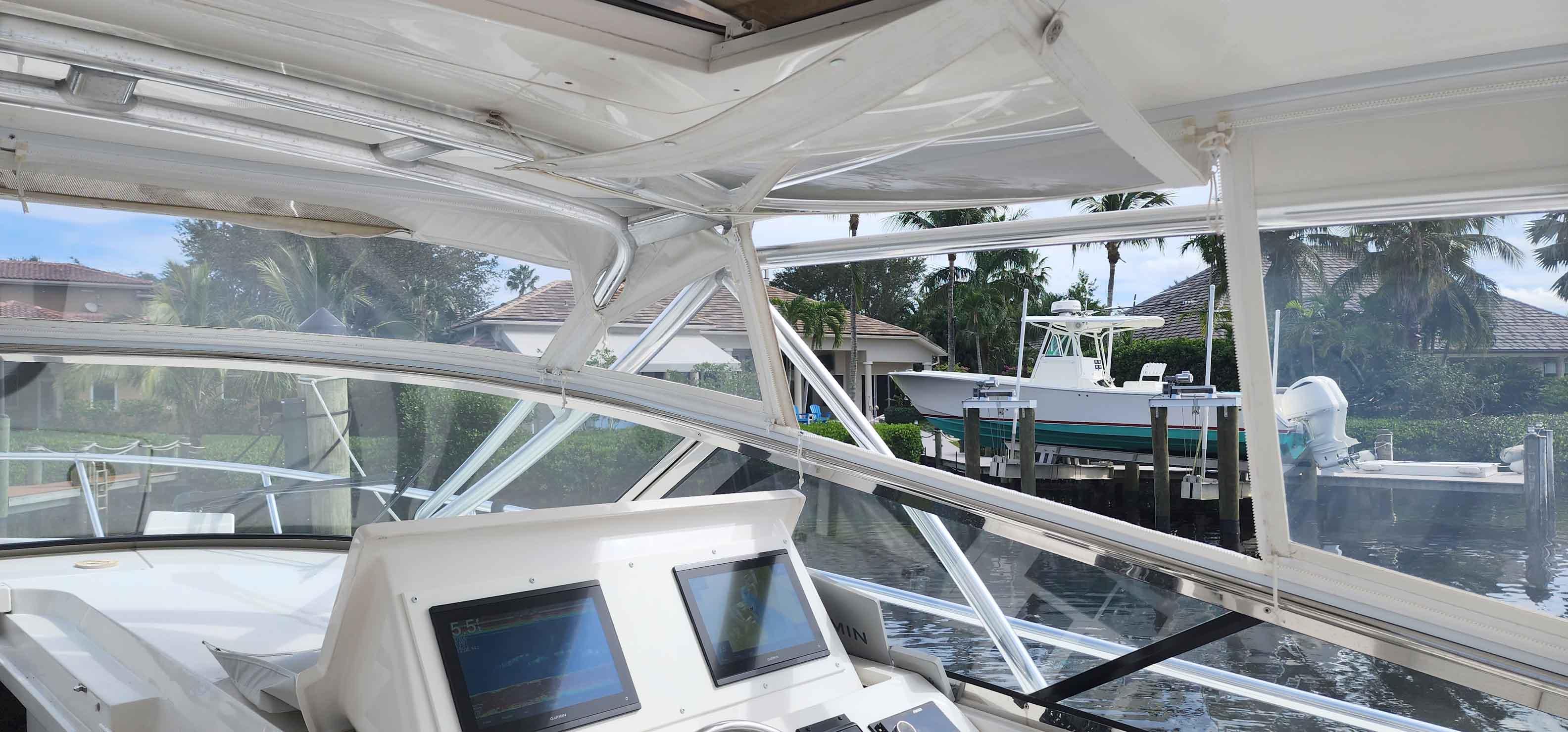 Interior view of a 2008 Intrepid 430 Sport Yacht with navigation screens.