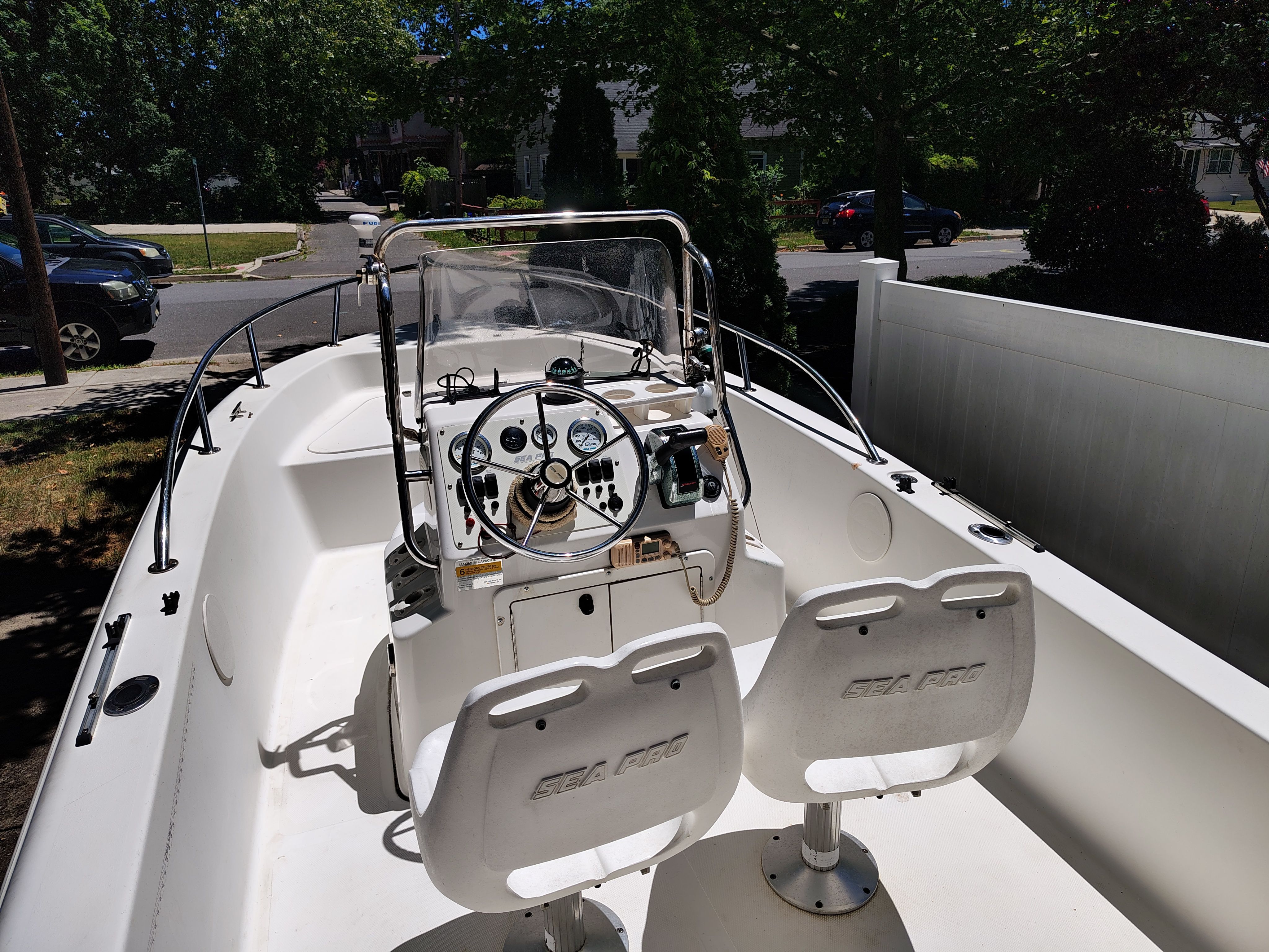 2003 Sea Pro 180 Center Console with helm and two seats.