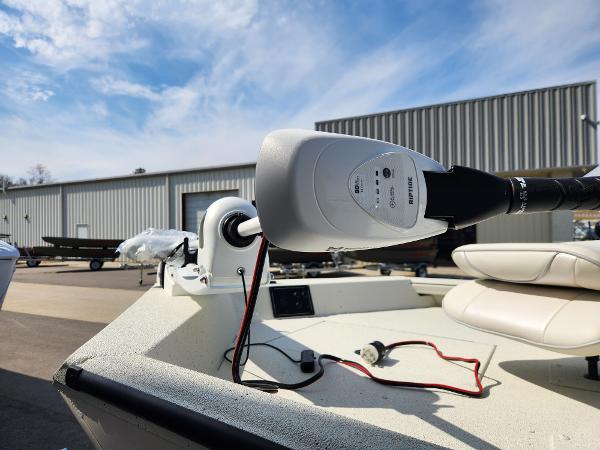 2025 Ranger RB200 boat with motor, parked outdoors under a clear sky.