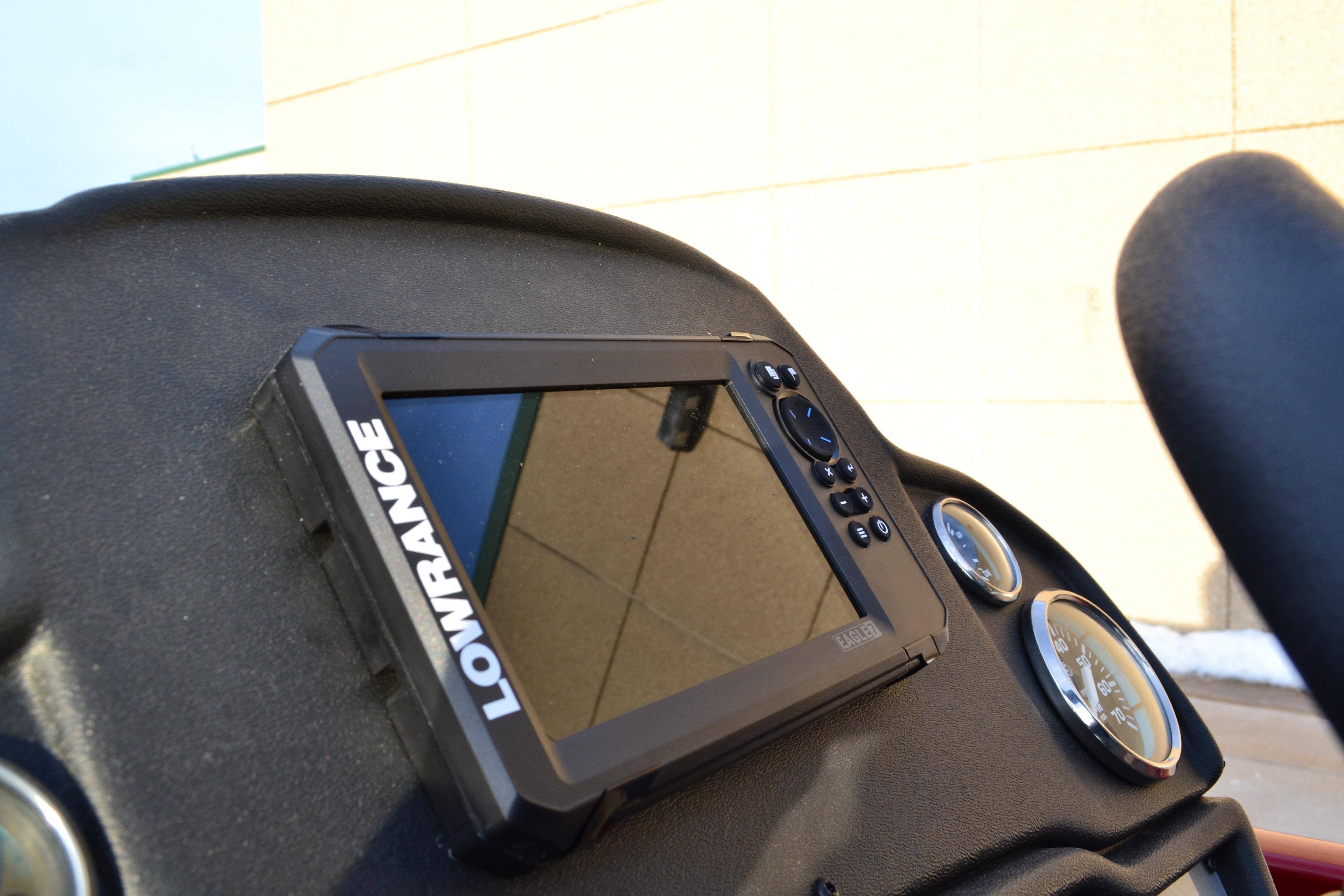 Lowrance fishfinder on 2026 Ranger RT188 boat dashboard with gauges.