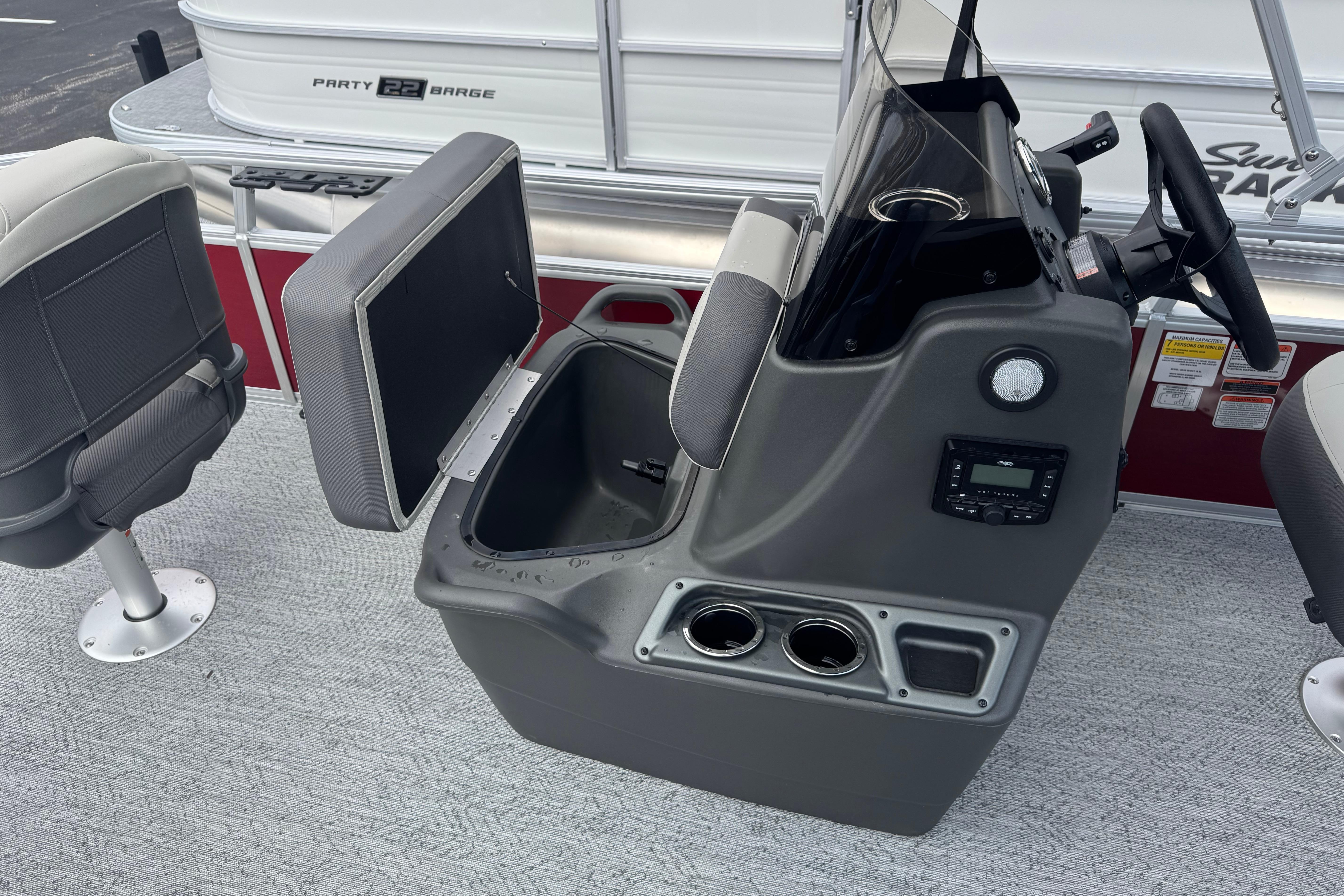 2026 Sun Tracker Bass Buggy 16 XL Select boat interior with open storage compartment and seating.