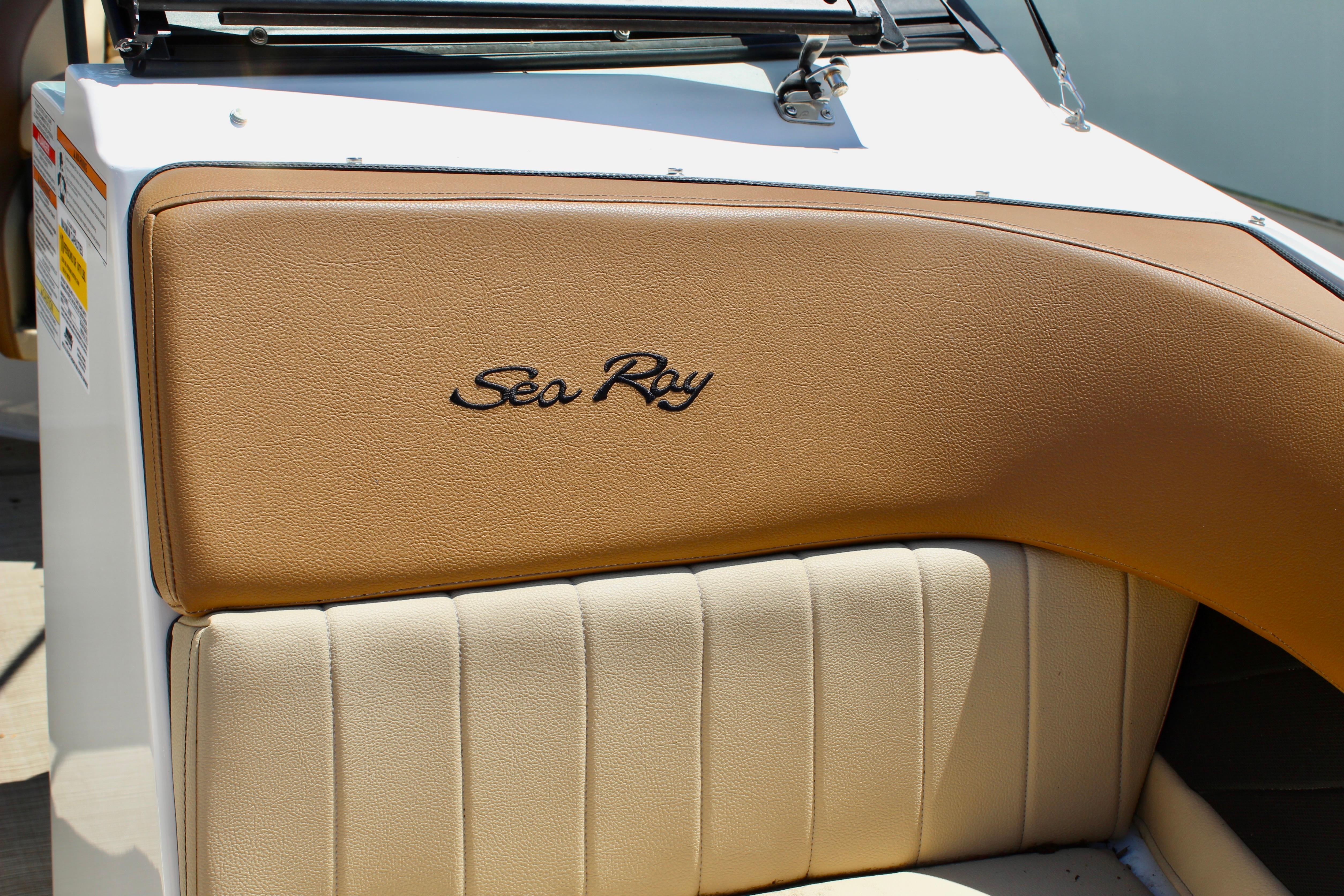 2018 Sea Ray SPX 190 Outboard boat interior with tan upholstery and logo.