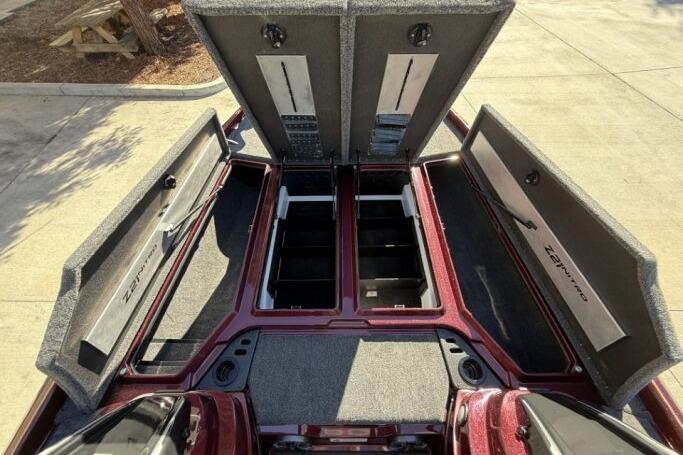 2026 Nitro Z21 XL Pro boat storage compartments open, showcasing spacious interior.