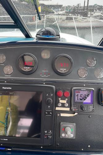 Dashboard of a 2003 Tiara Yachts 3500 Open with navigation system and instruments.