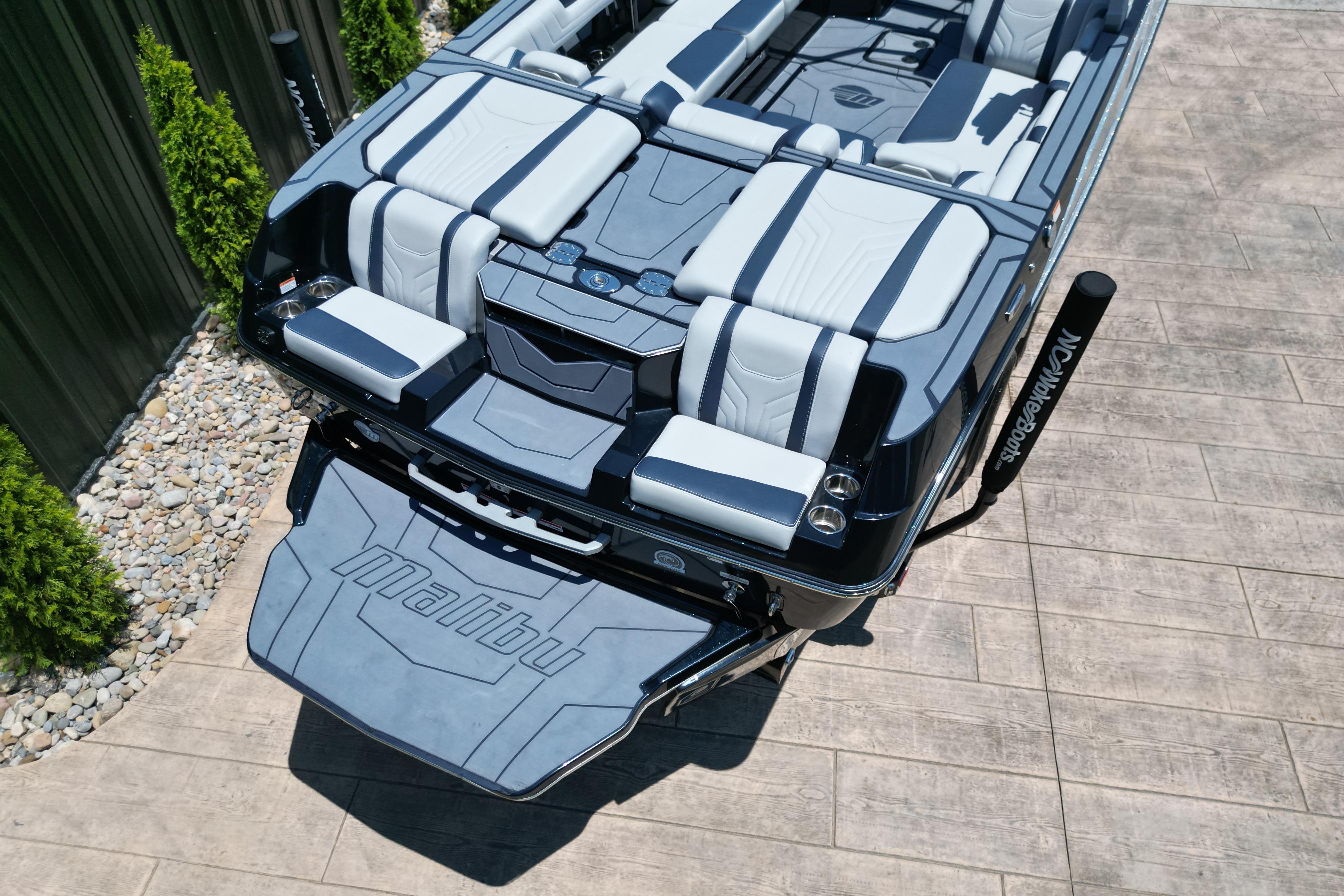 2025 Malibu Wakesetter 25 LSV boat with sleek seating and modern design.