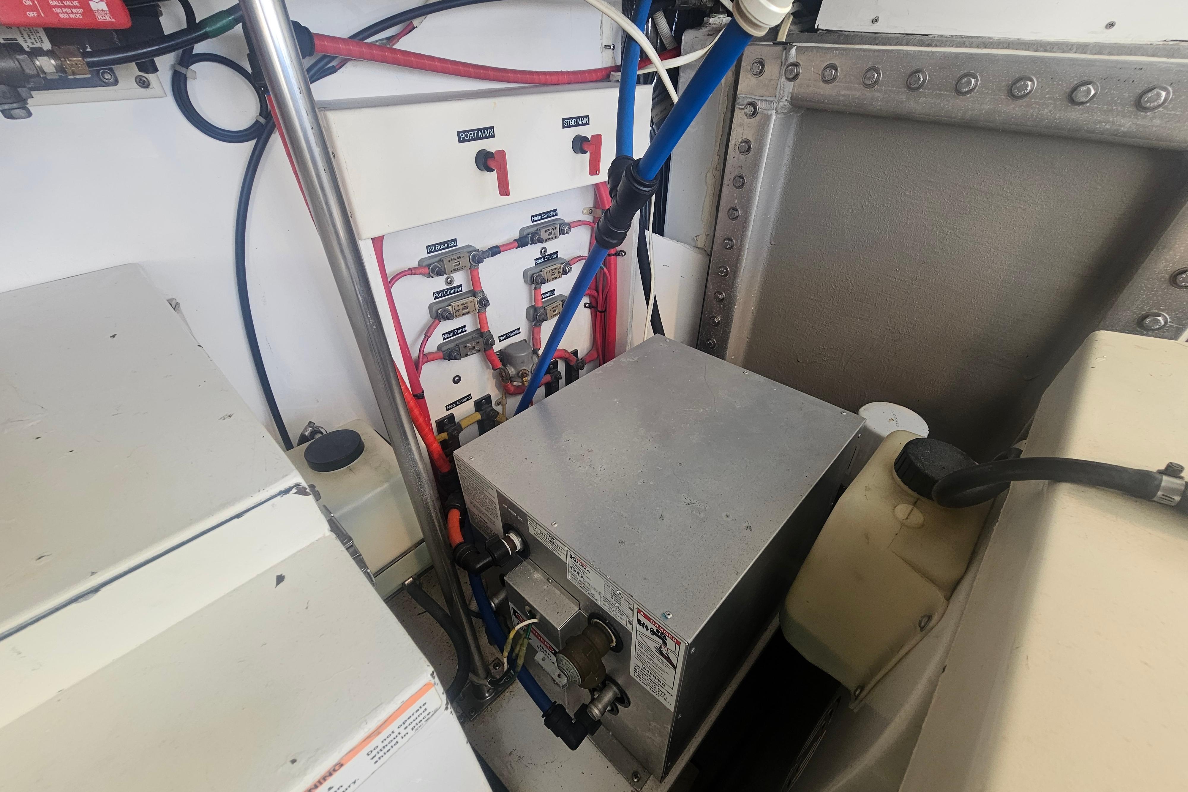 Electrical panel and components inside a 2003 Topaz 32 Express boat.