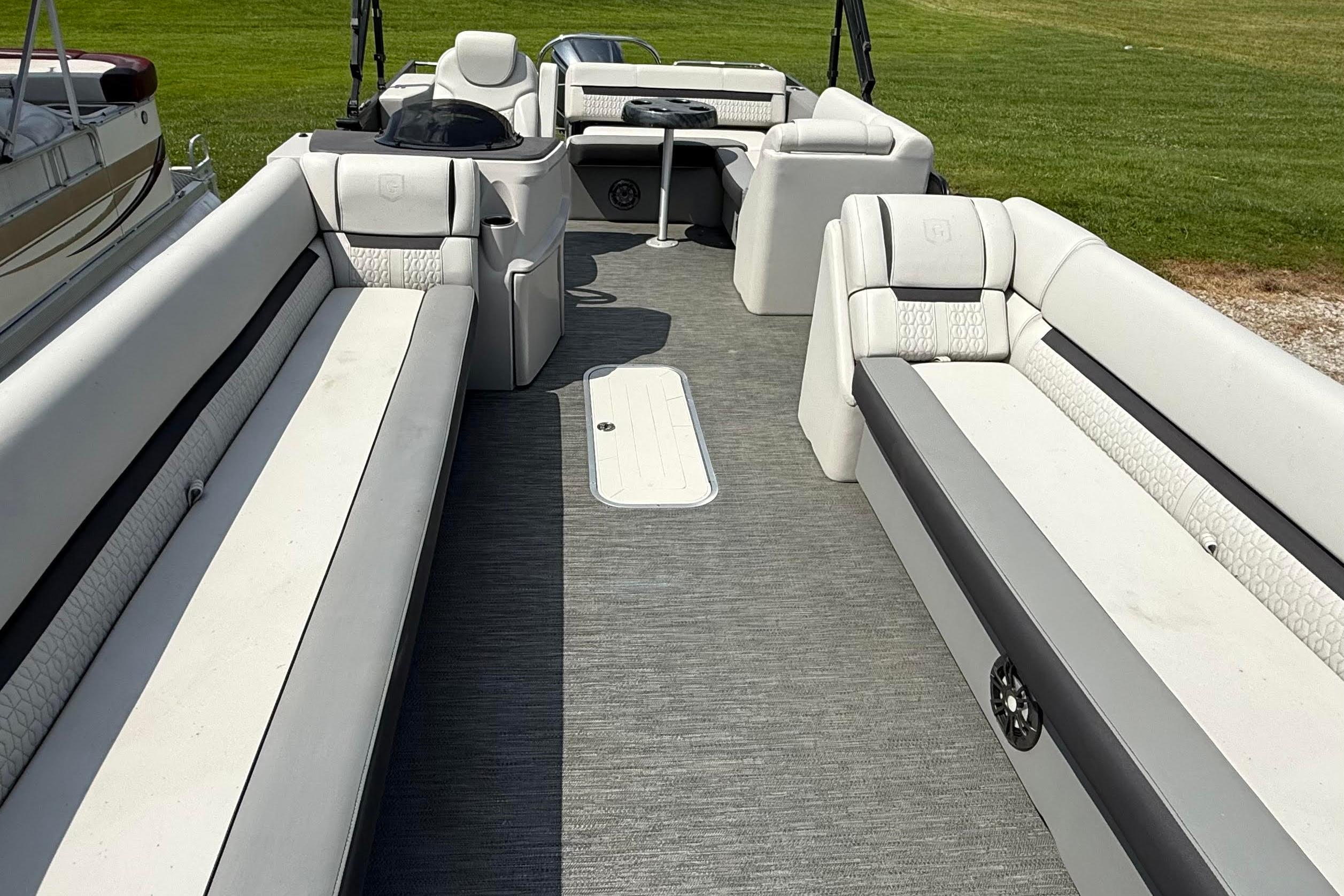2022 Godfrey SWEETWATER 2486 pontoon boat interior with spacious seating and modern design.