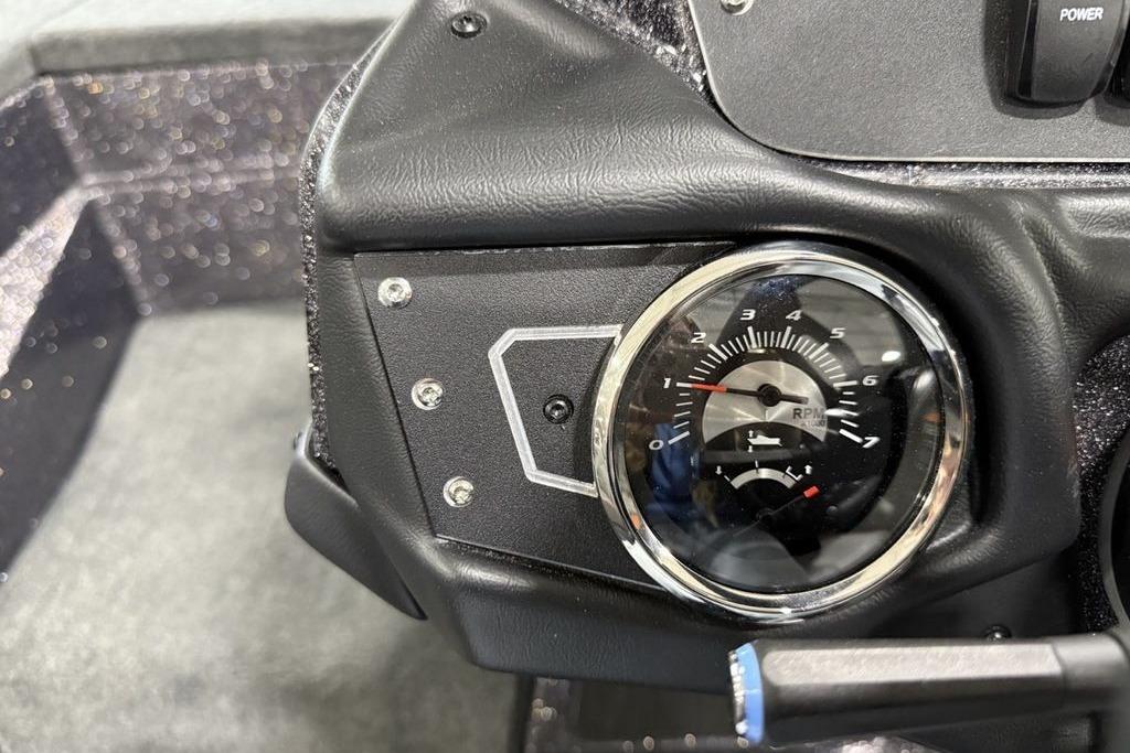 2025 Skeeter ZX150 dashboard with RPM gauge and power switch.