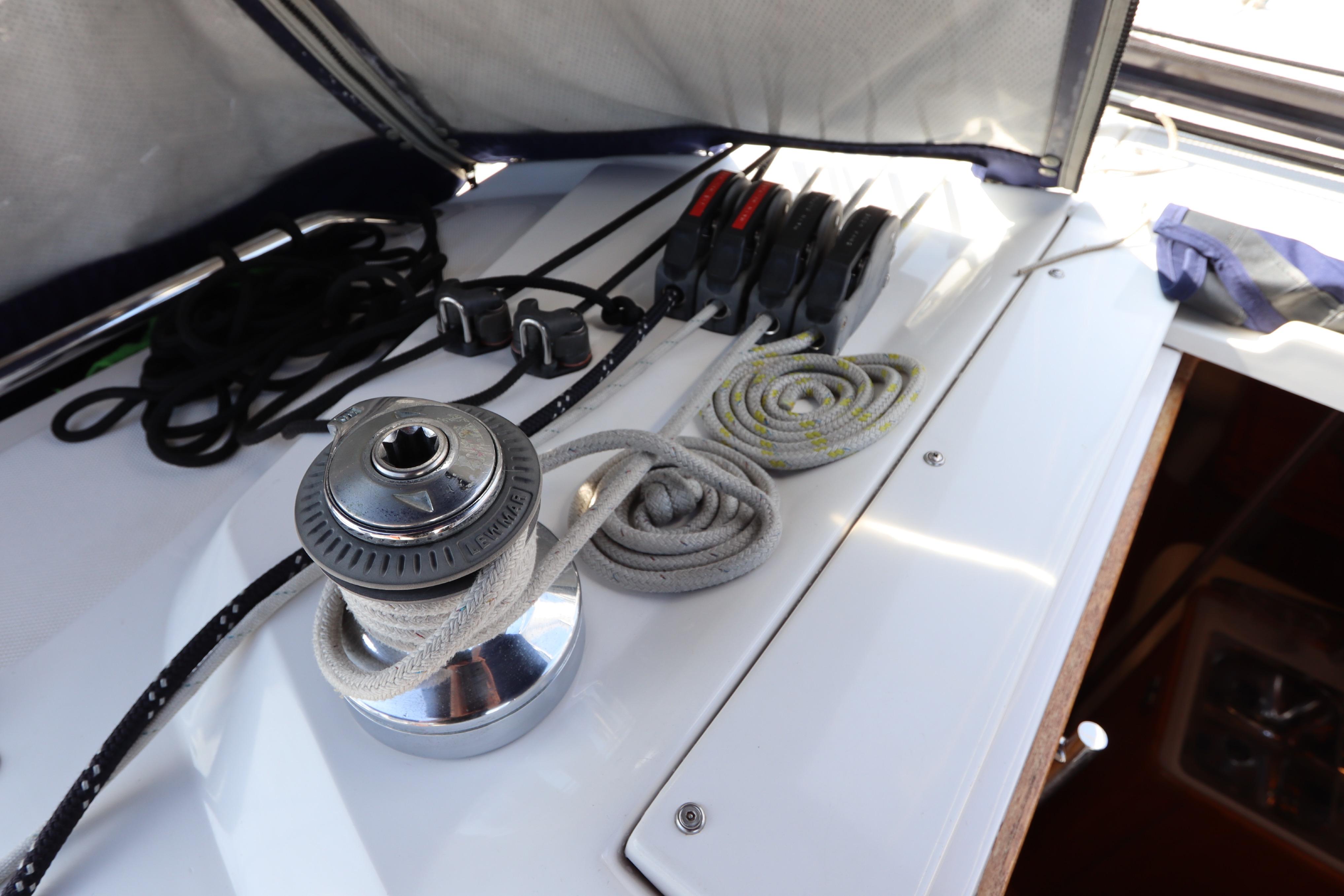 Sailing equipment on a 2011 Catalina 355 yacht, featuring winch and ropes.