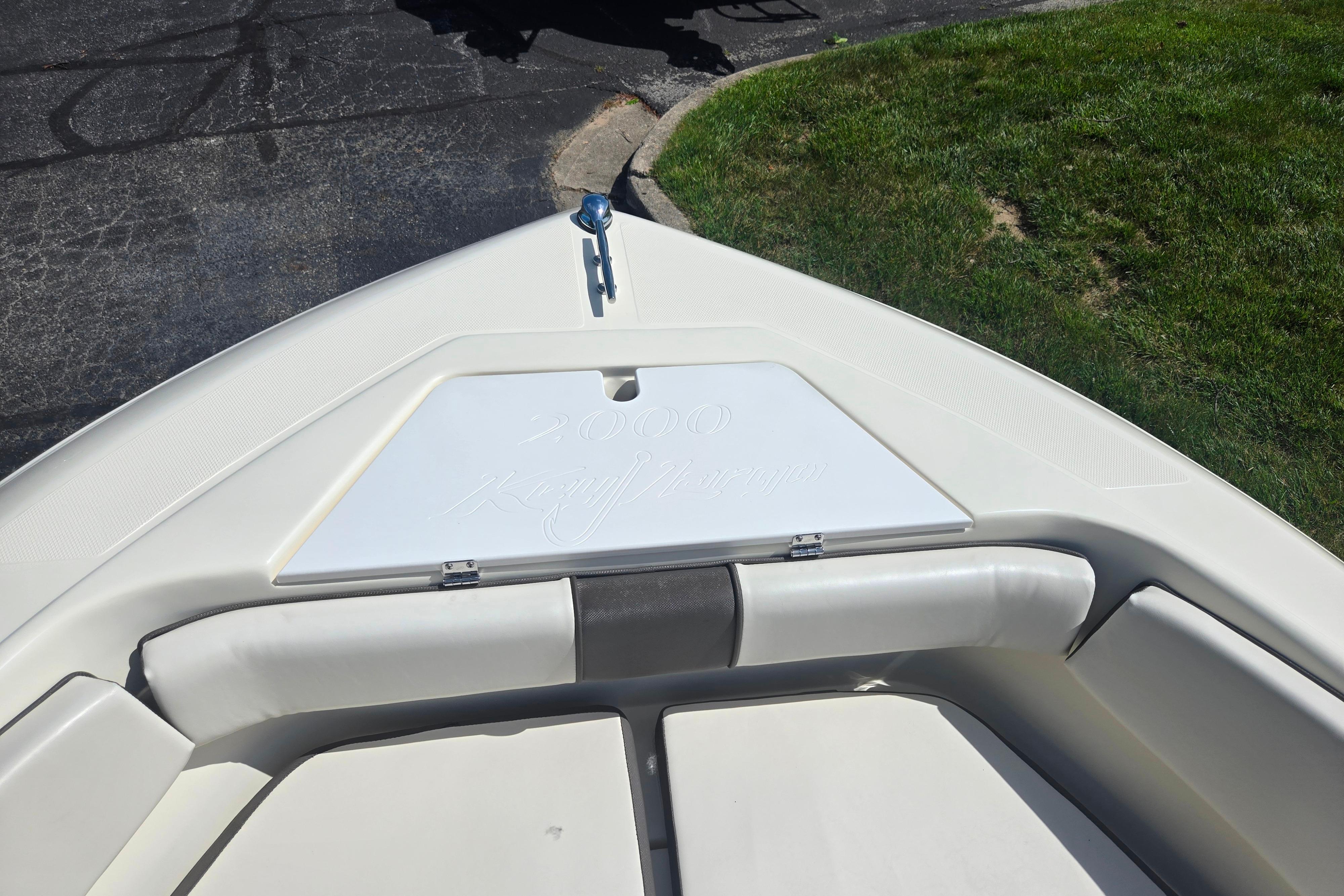 Bow of a 2016 Key Largo 2000CC boat with cushioned seating.
