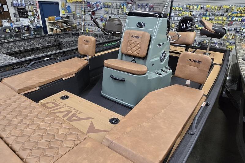 2026 Avid 207 Recon boat interior with tan seating and modern console design.