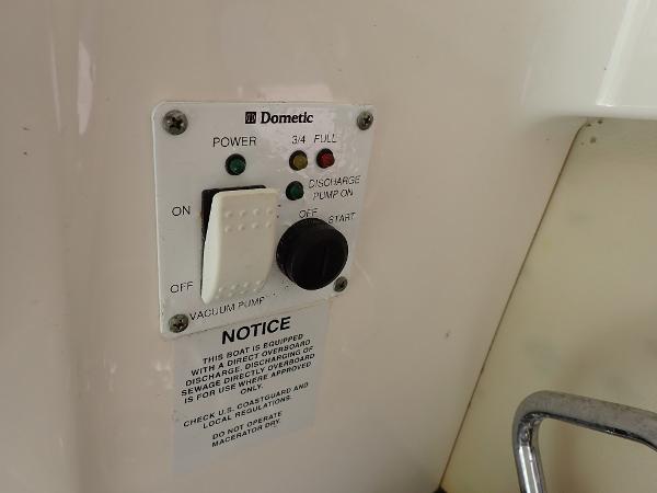 Control panel for Dometic vacuum pump on 2011 Chaparral 287 SSX boat.