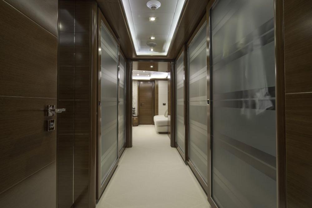 Luxurious yacht interior hallway with modern design, CRN 129, 2009 model.
