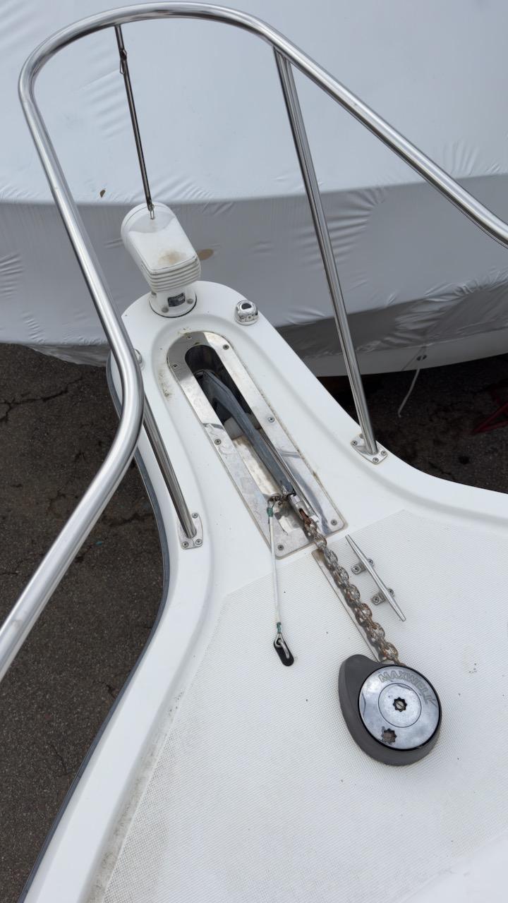 2005 Tiara Yachts 2900 Open bow with anchor chain and railing.