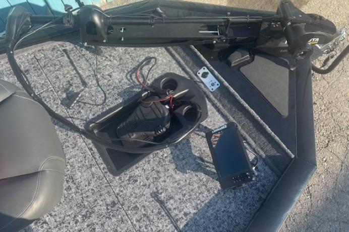 2026 Tracker Pro Team 195 boat deck with fishing equipment and electronics.