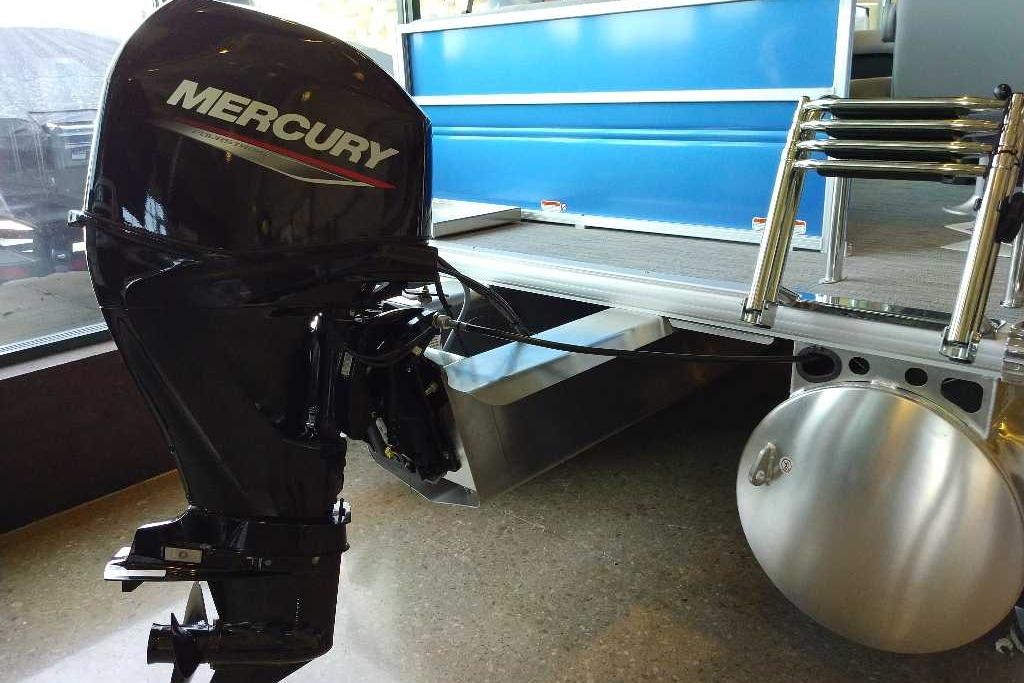 2026 Sun Tracker Party Barge 16 DLX with Mercury outboard motor, side view.