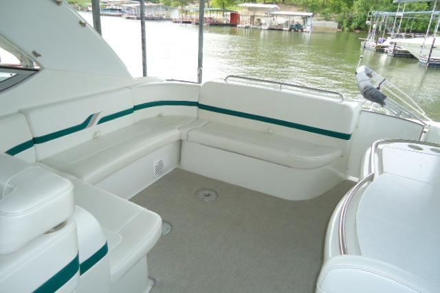 1999 Formula 400 Super Sport boat interior with white seating and green accents.