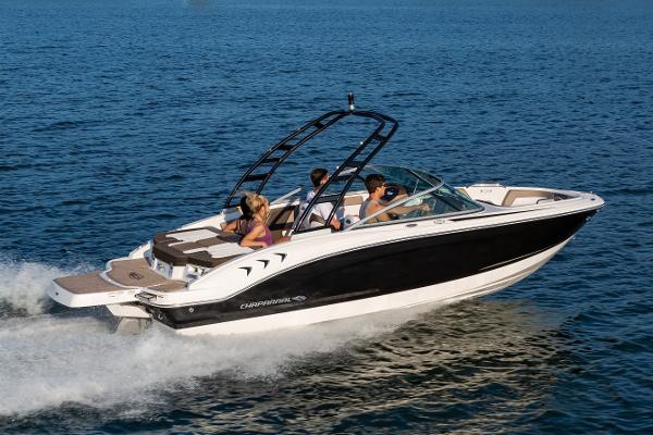Manufacturer Provided Image: 2025 Chaparral 21 SSi boat cruising on open water with passengers enjoying the ride.