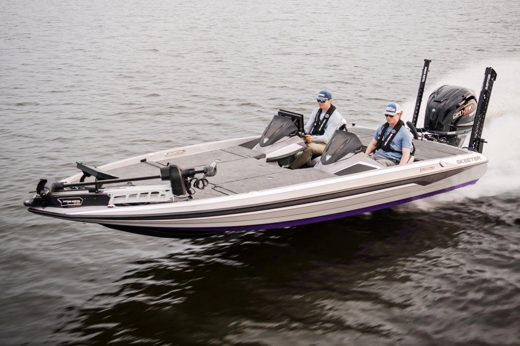 Manufacturer Provided Image: 2026 Skeeter FXR21 FLEX boat cruising on water with two passengers.