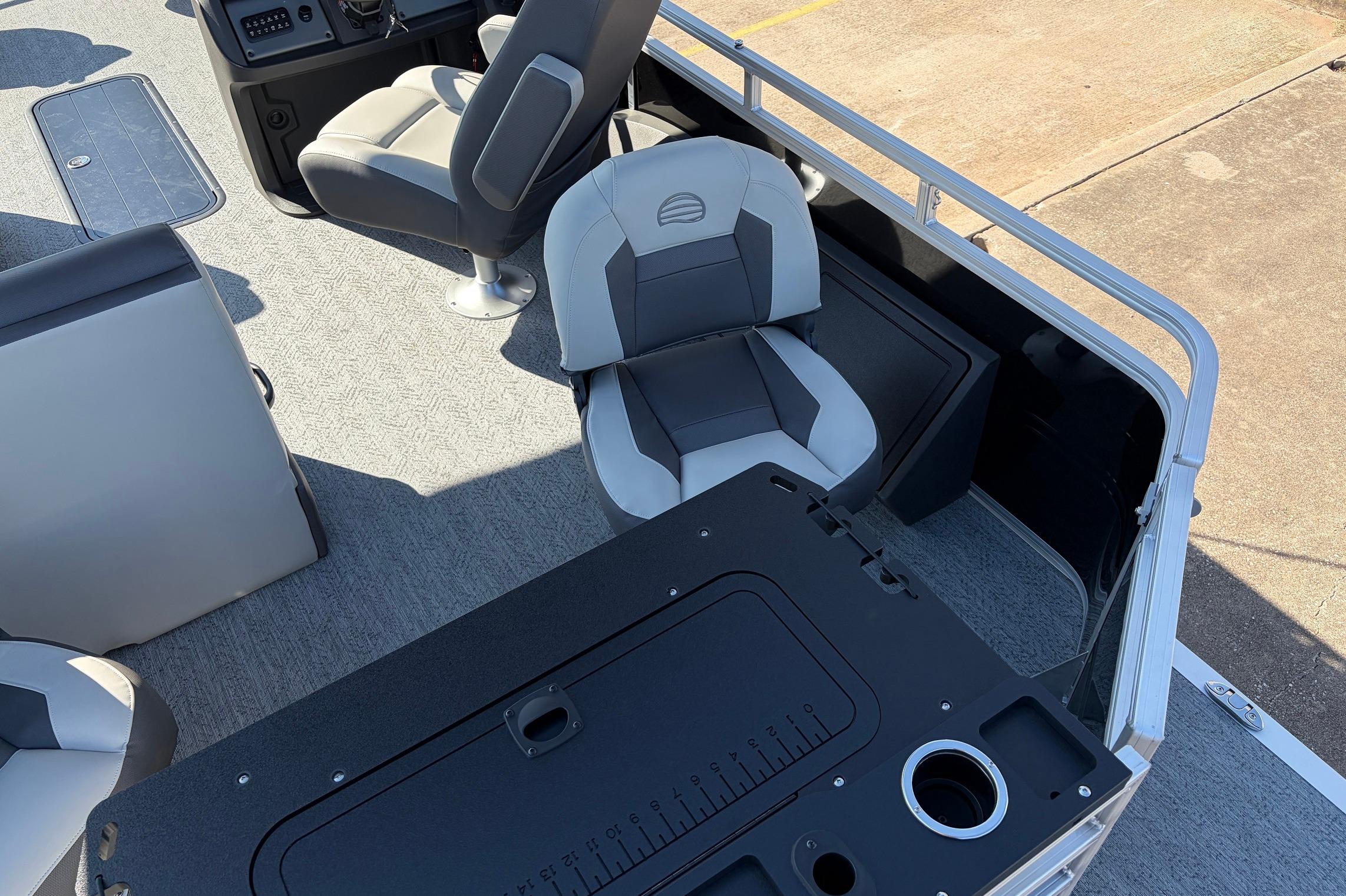 2026 Sun Tracker Fishin' Barge 22 XP3 interior with seating and console details.