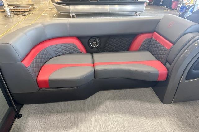 Luxurious seating on 2027 Godfrey Monaco 25' Tritoon, featuring stylish red and gray upholstery.