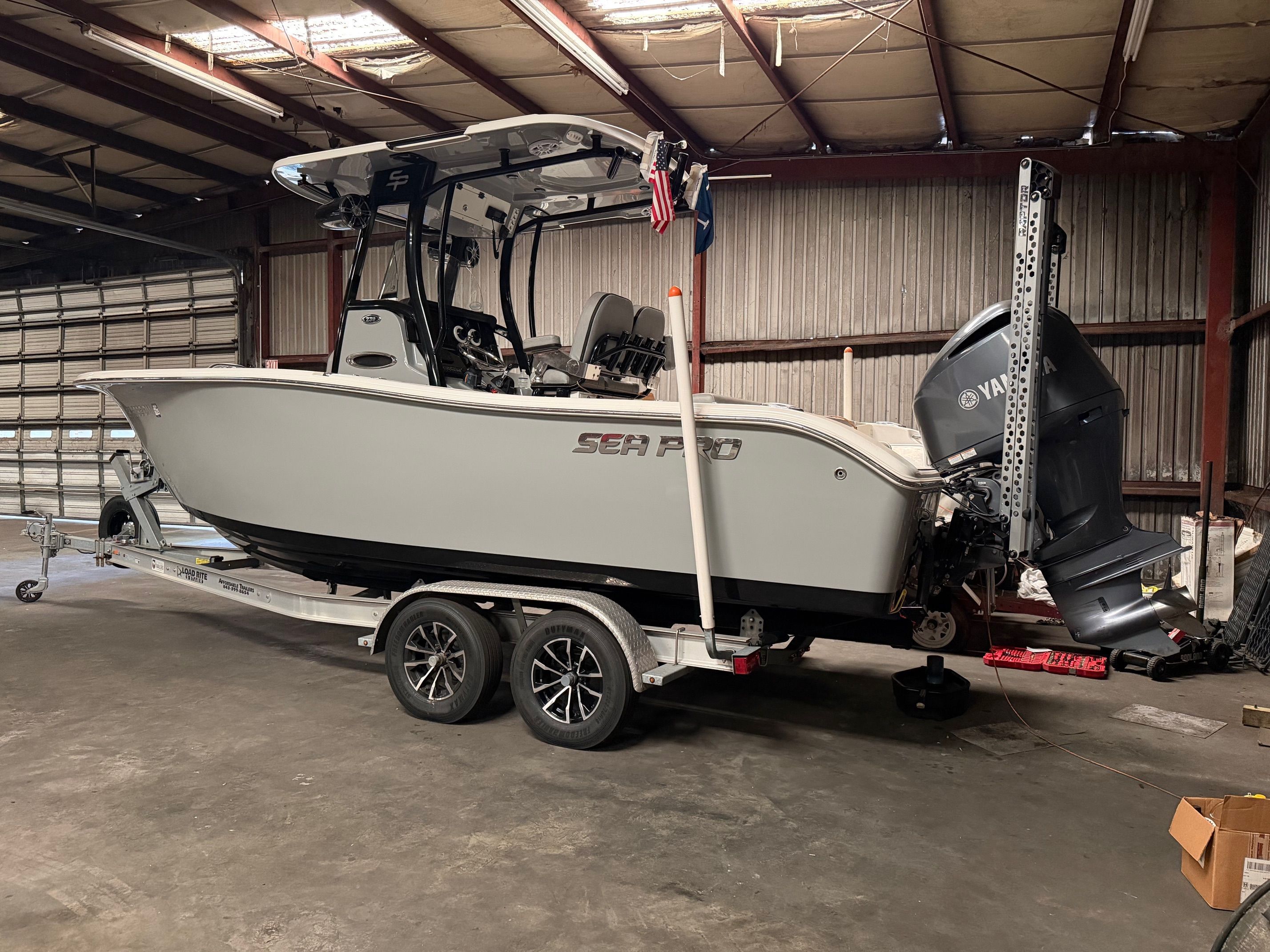 2020 Sea Pro 239 Center Console boat in warehouse.