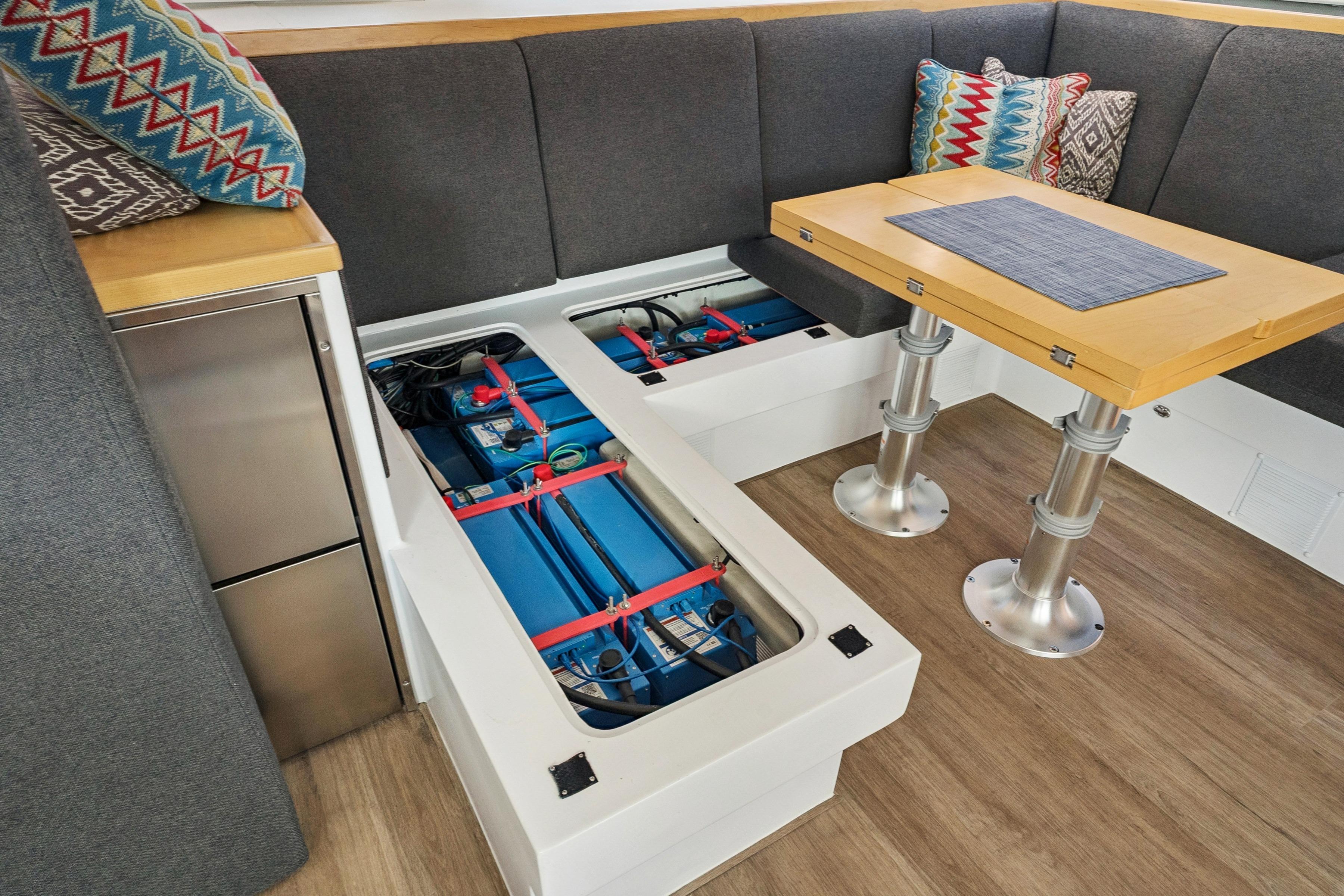 2024 St Francis 460 yacht interior with battery storage under seating area.