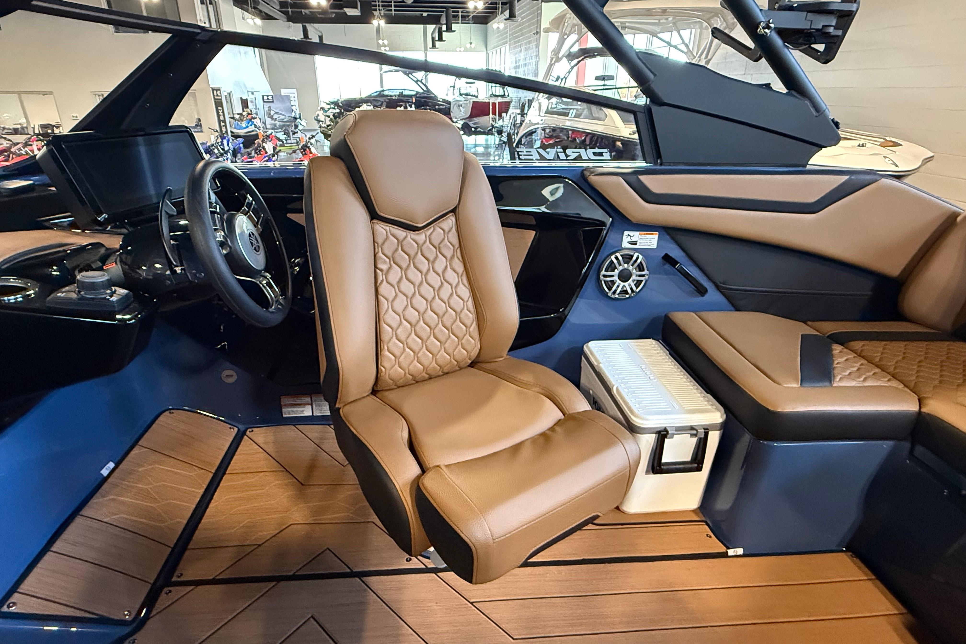 2026 Yamaha Boats 222XD interior with luxurious seating and modern dashboard design.
