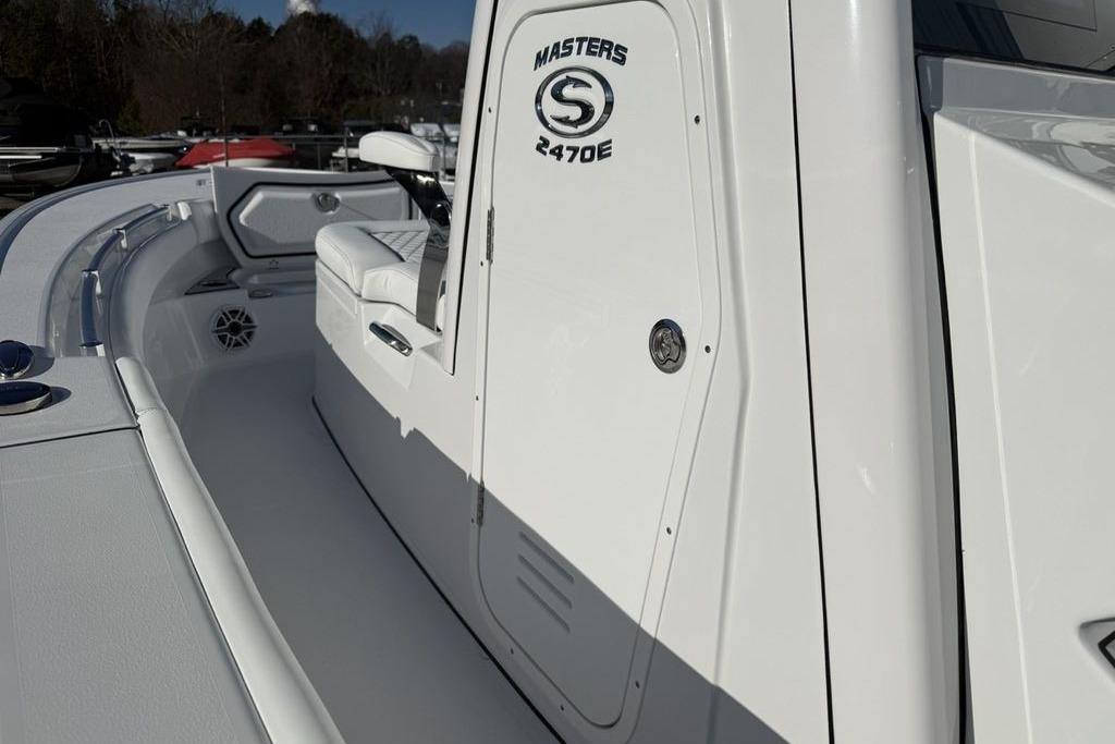 2026 Sportsman Masters 247OE Bay Boat, sleek white design, spacious deck, modern features.