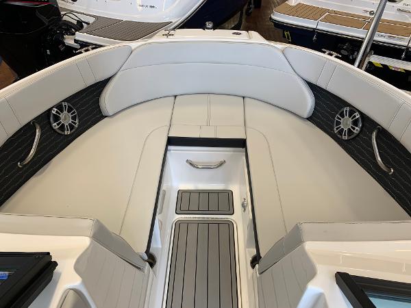 2025 Sea Ray SPX 230 boat interior with white seating and sleek design.