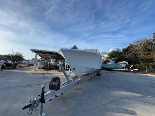 2025 Yellowfin 39 Offshore boat on trailer in a marina setting.