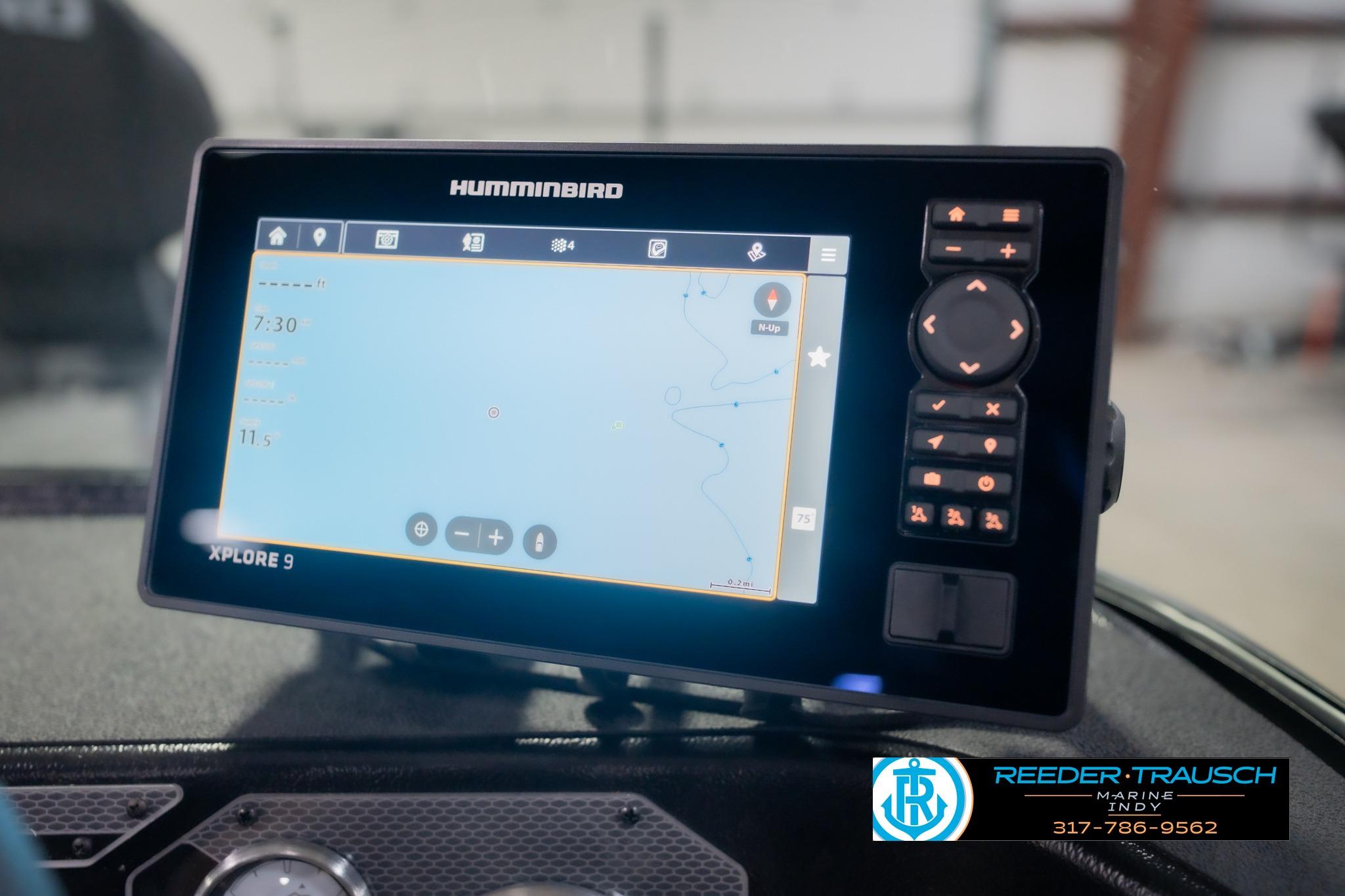 Humminbird Xplore 9 fishfinder on 2026 Lund 2075 Impact XS boat dashboard.