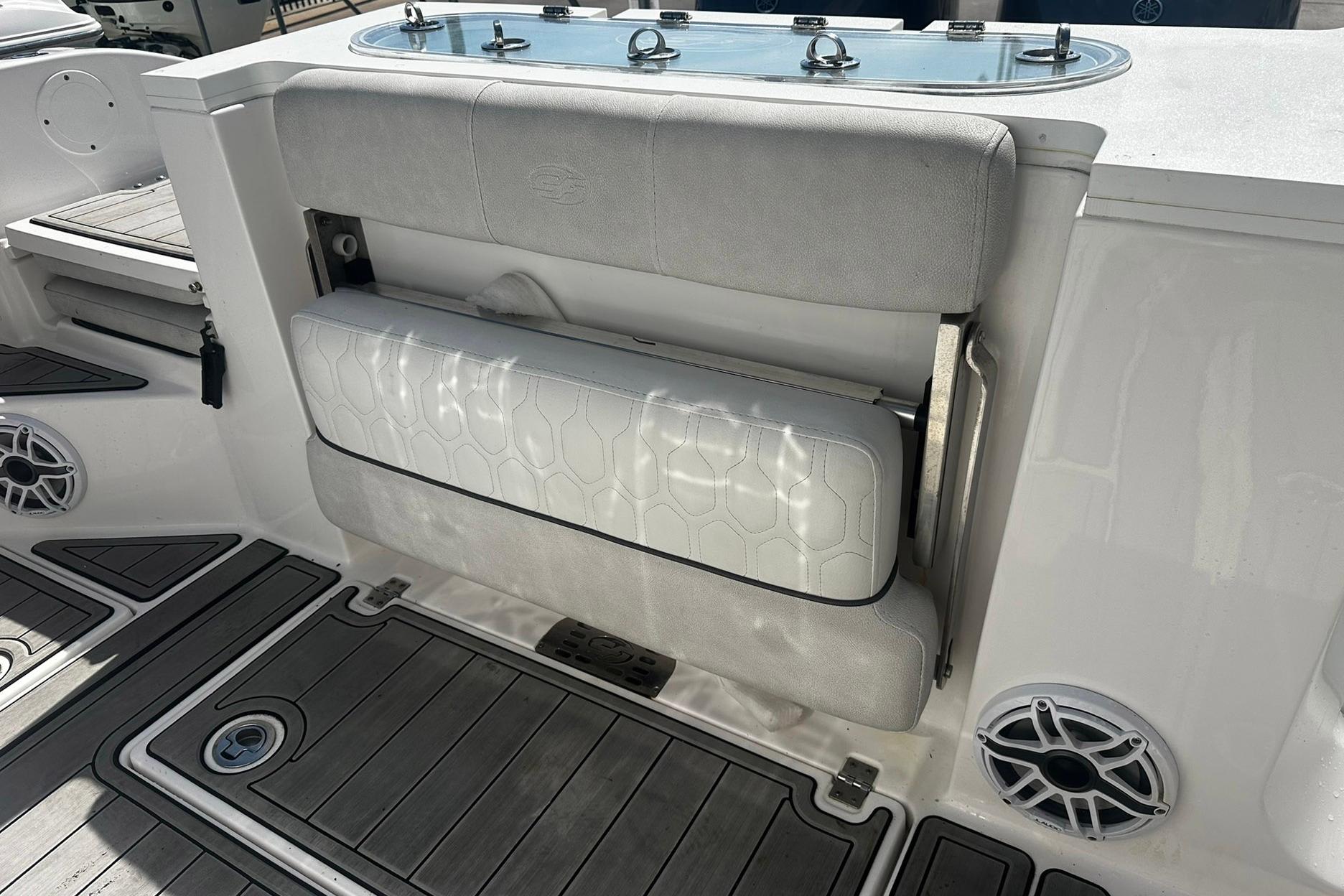 Foldable seat on a 2002 Sea Fox 228 Commander boat deck.
