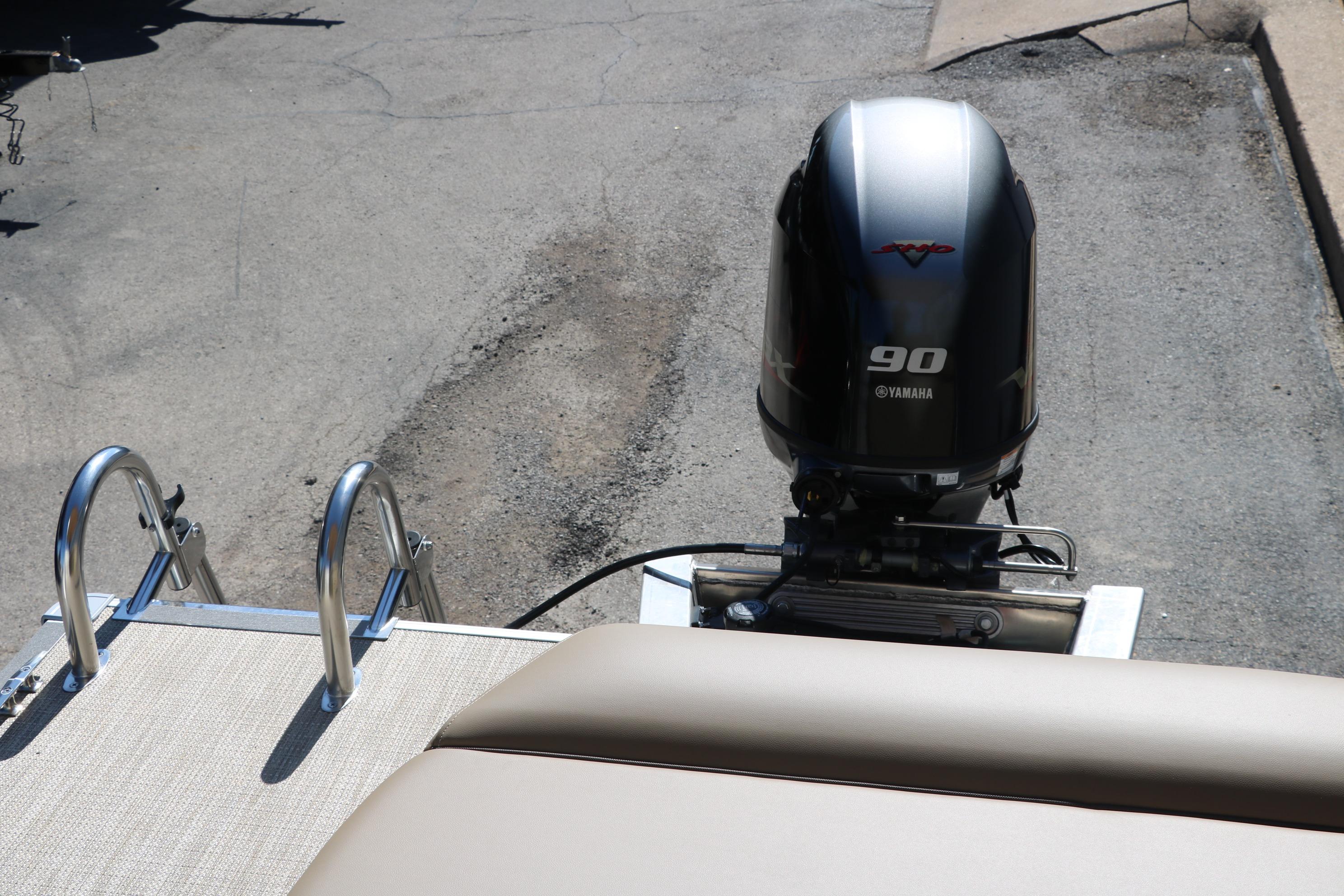2025 Sylvan Mirage 820 CLZ DH boat with Yamaha 90 engine, rear view.