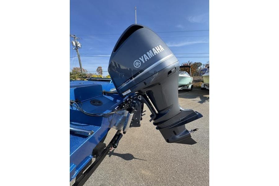 2026 SeaArk Dynasty 2.0 boat with Yamaha outboard motor, parked outdoors.