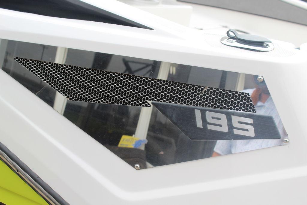 2017 Scarab 195 boat detail with honeycomb vent and model number.