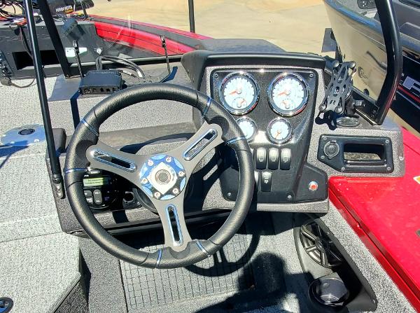 2024 Tracker Targa V-19 WT boat dashboard with steering wheel and instrument panel.