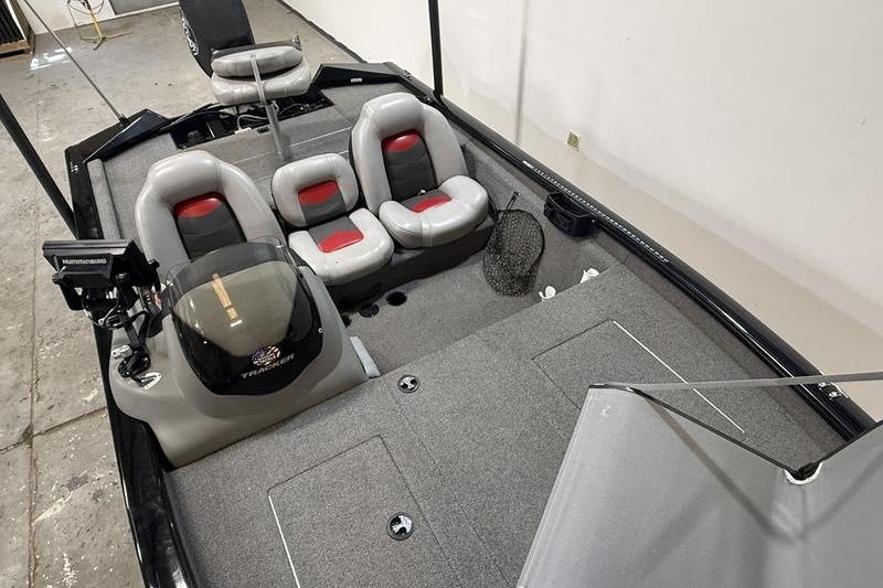 2016 Tracker Pro Team 175 TXW fishing boat interior with seating and equipment.