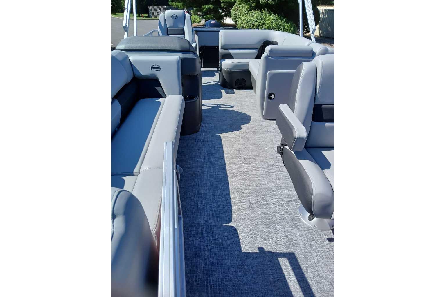2026 Sun Tracker SportFish 20 DLX interior with spacious seating and modern design.