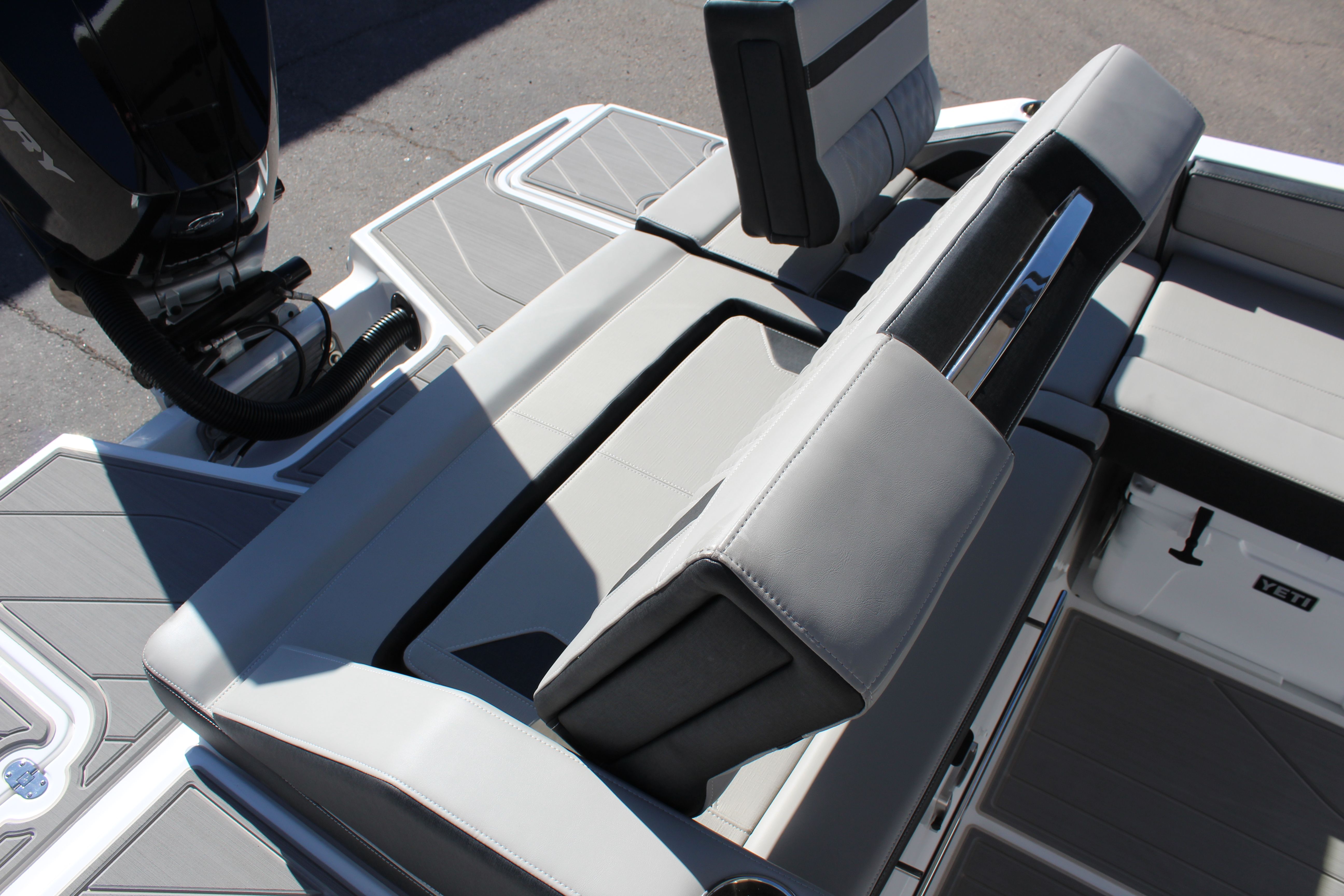 Luxurious seating in the 2025 Monterey Elite 27 OB boat.