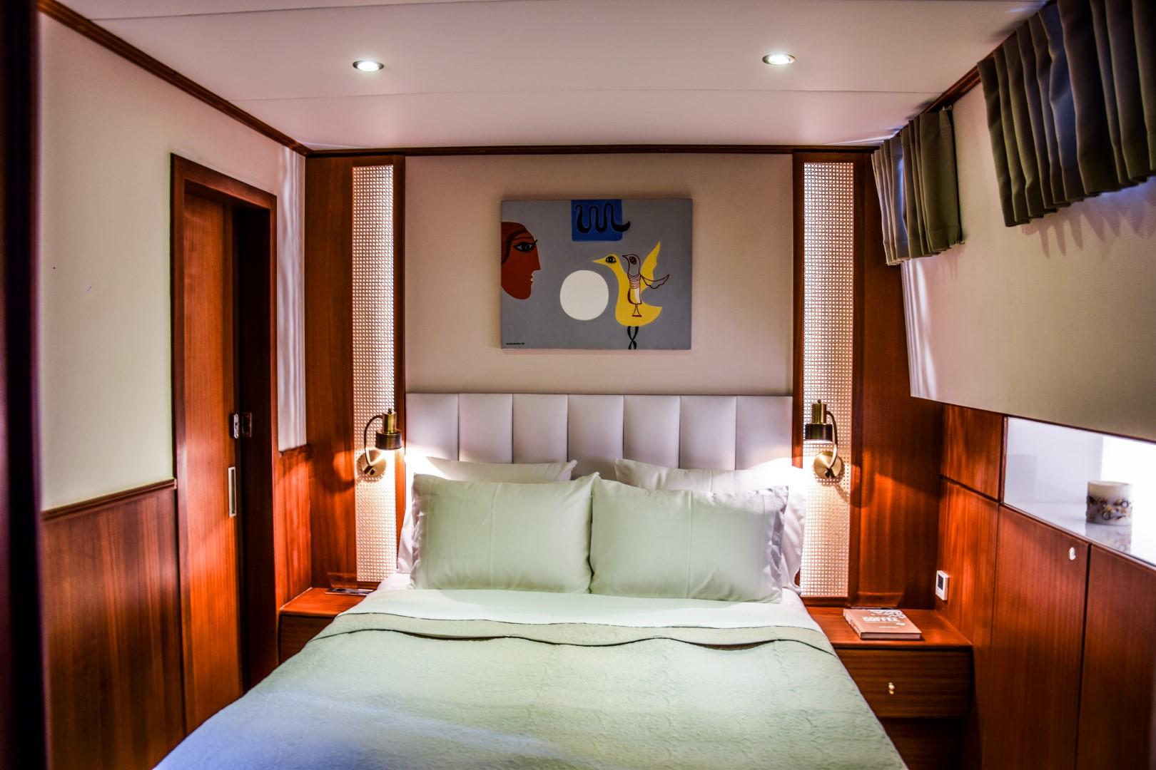 Luxurious bedroom interior on a 2007 Custom 34m Steel Hull Gulet yacht.