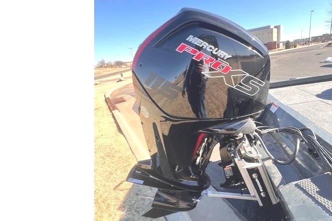 2026 Ranger RT188P boat with Mercury Pro XS outboard motor in sunny setting.